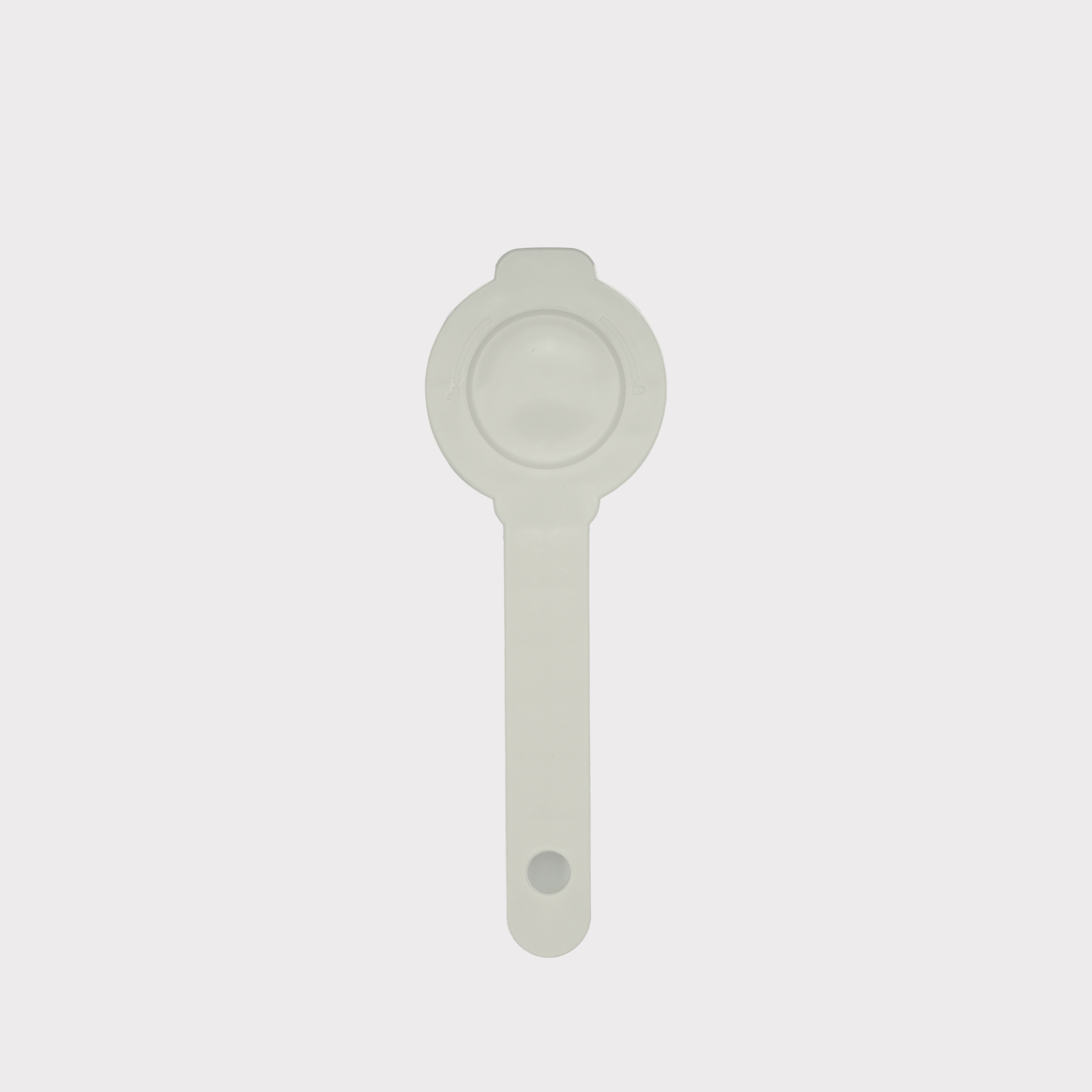 White plastic filter replacement wrench